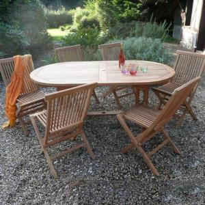 Luxury teak six seater folding table with folding chairs.